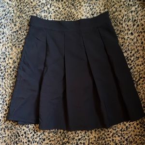 black pleated skirt